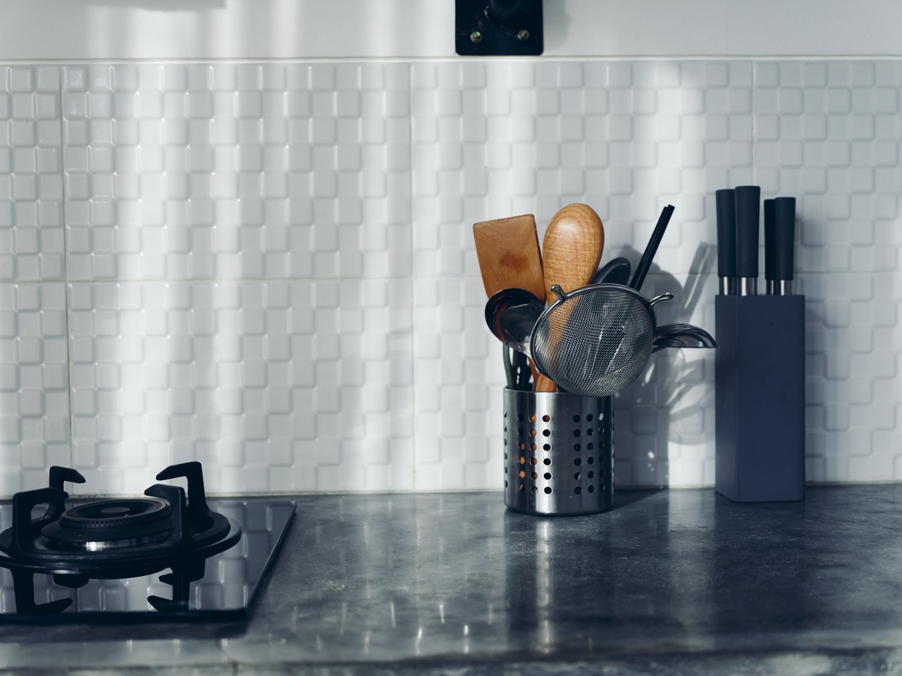 Modern decor in the kitchen for cooking, stylish interior, concrete elements.